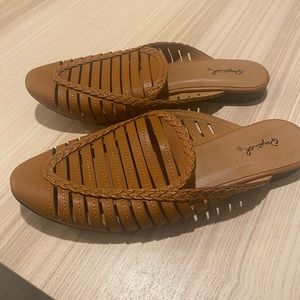 A pair of brown mules size 6.5